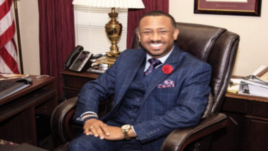 Forner Morris Brown College President Kevin James sits in a chair