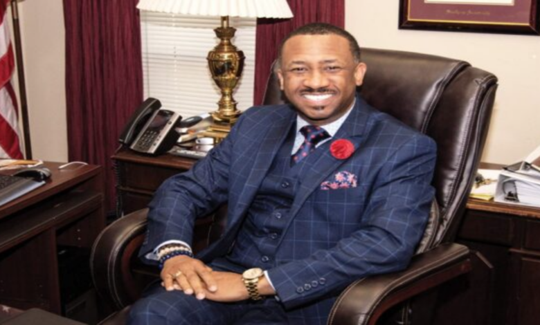 Forner Morris Brown College President Kevin James sits in a chair