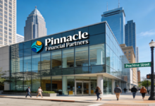 Realistic photo of a modern Pinnacle Financial Partners bank branch on Peachtree Street in downtown Atlanta, featuring a sleek glass facade with prominent signage, subtle Synovus merger elements, bustling pedestrians, street sign, and the city skyline under bright blue skies. (see the generated image above)