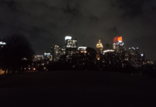 Atlanta skyline at night with illuminated downtown buildings