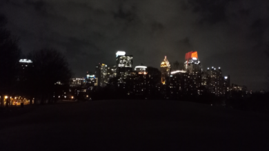 Atlanta skyline at night with illuminated downtown buildings