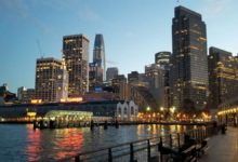 San Francisco Embarcadero skyline at dusk featuring the Ferry Building and Salesforce Tower, 8-year anniversary photo.