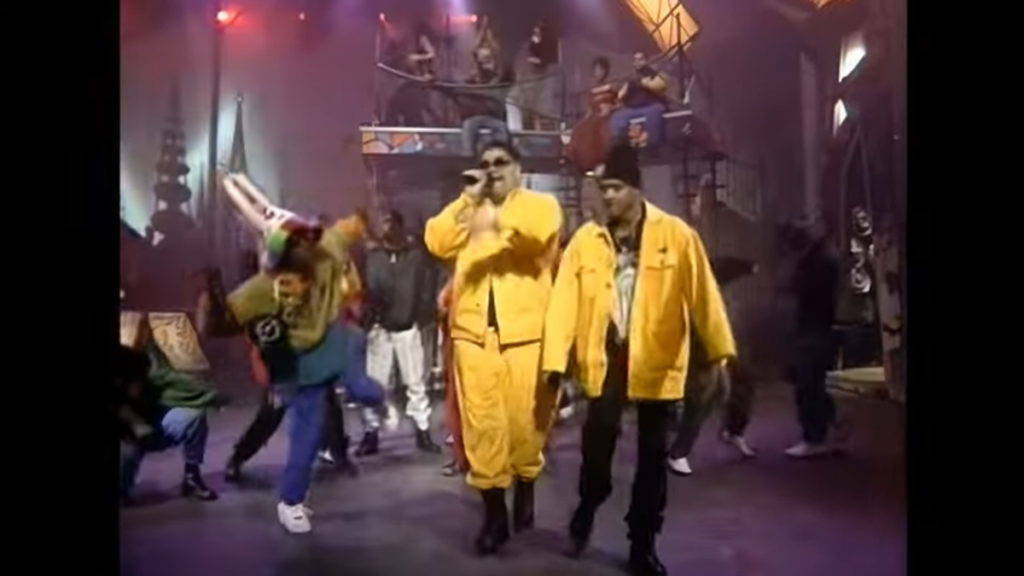 Heavy D performance on In Living Color with Tupac and Sean Combs in the background.